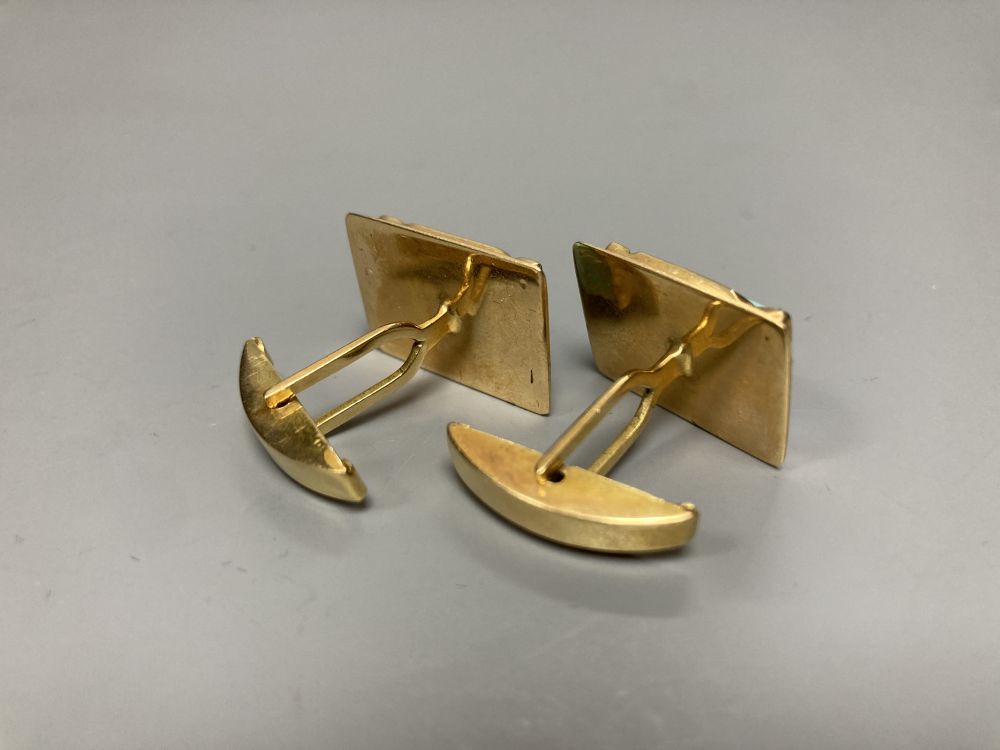 A pair of yellow metal and turquoise set rectangular cufflinks, 20mm, gross 15.8 grams.